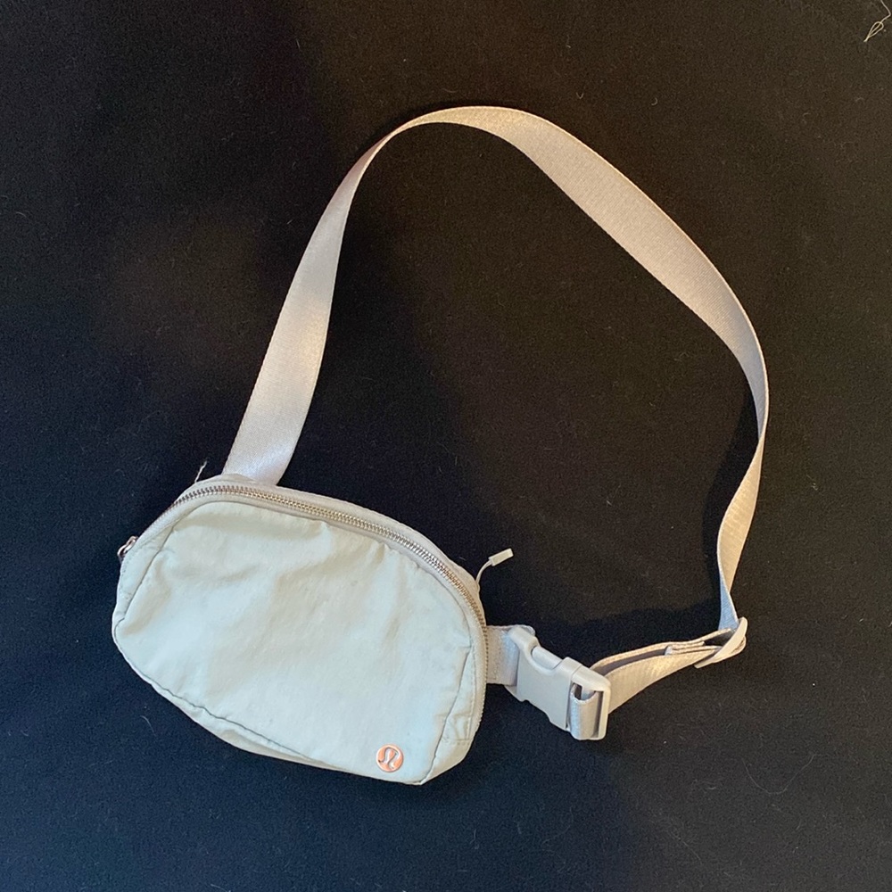 Lululemon Everywhere Crossbody Belt Bag Silver. Used a couple of times.